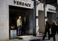 Prada Group says it has purchased fashion rival Versace in a deal worth nearly $1.4 billion